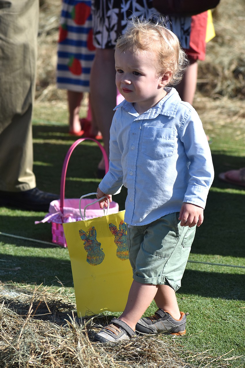 Barrett Schuster waits for the Easter egg hunt to begin.