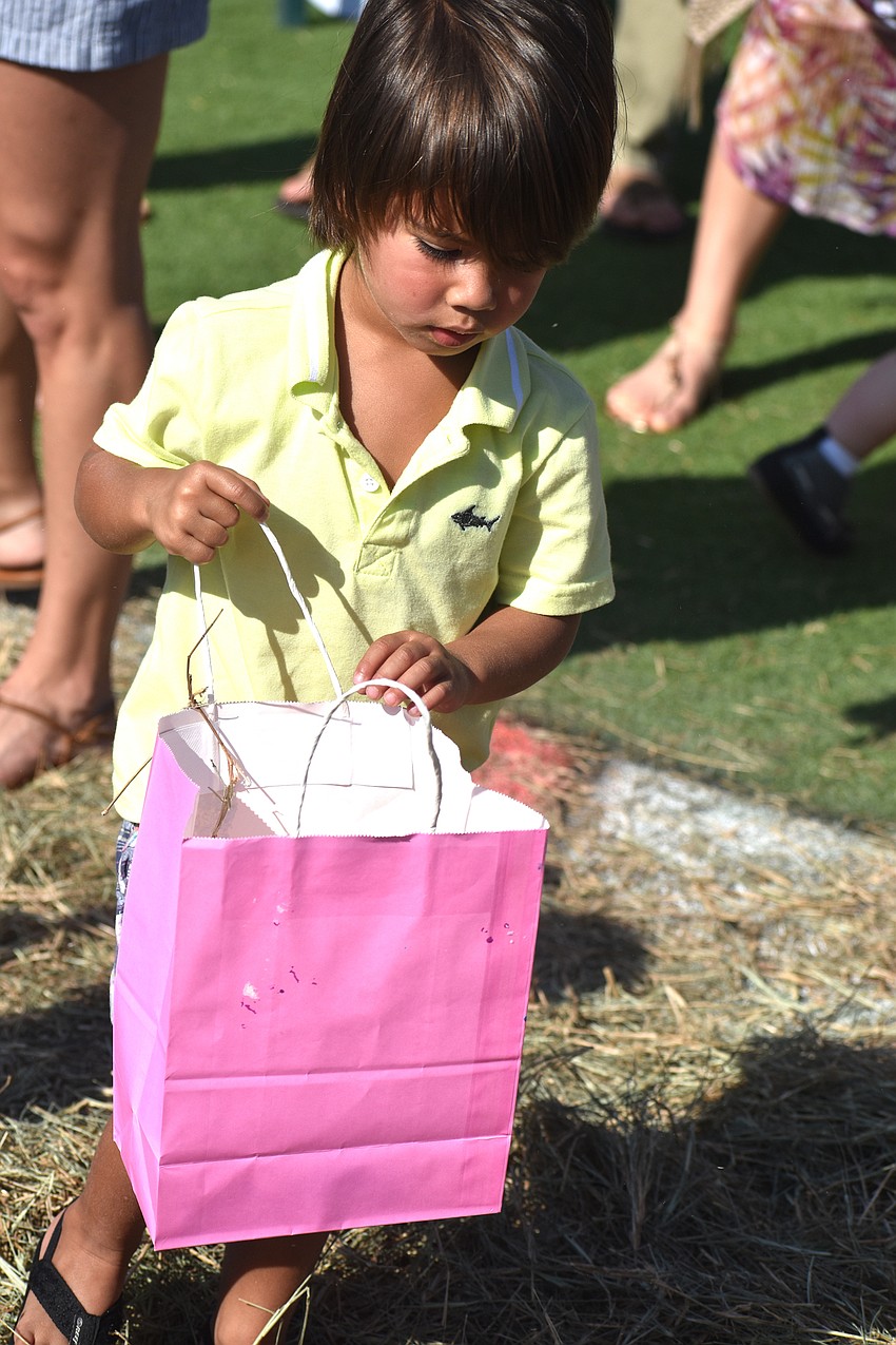 Rory Rasool searches for eggs.