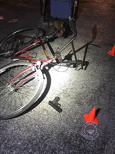 Sarasota police said a man on a bicycle produced a gun when officers tried to talk with him.