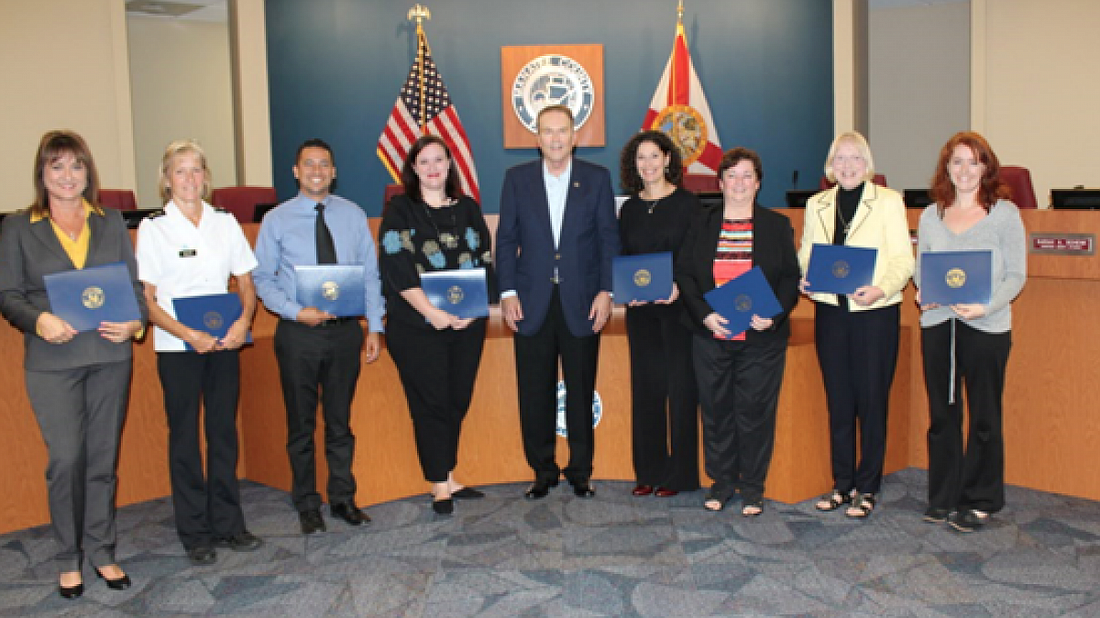 Congressman Vern Buchanan with the eight teachers who received awards. Courtesy image.