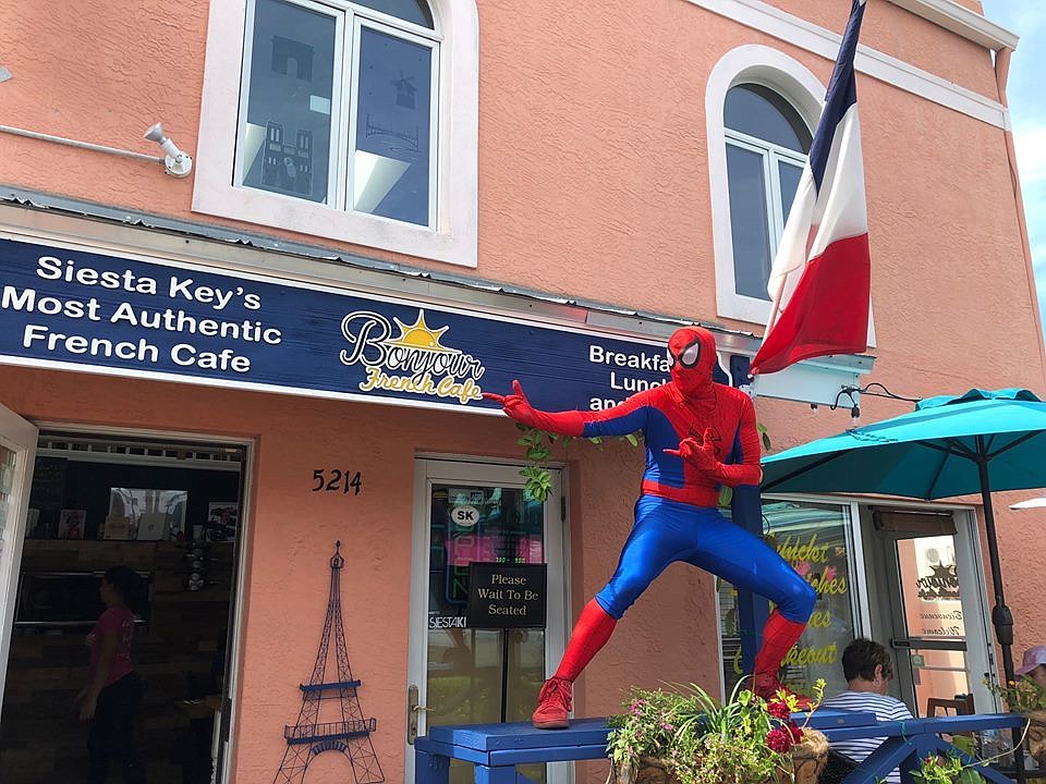 Siesta Key Village restaurant Bonjour French CafÃ© shared a photo of a man in a Spider-Man costume on its Facebook on March 8.