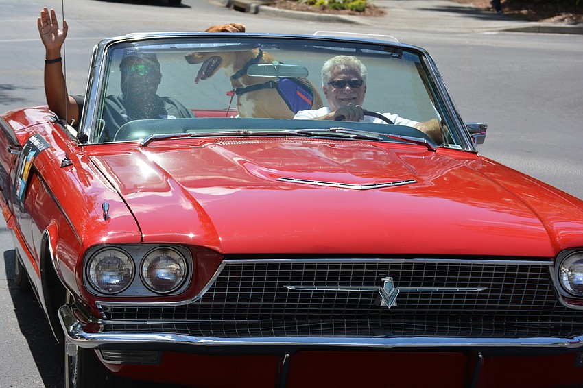 Staff Sgt. Christopher Gordon is delivered in a 1966 Thunderbird by Tony Milen, whose Clear Sunset Car Wash is a tournament sponsor.