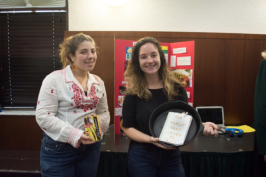 New College students Olivia Pertierra and Leigh Barber present their recipes and oral history projects.