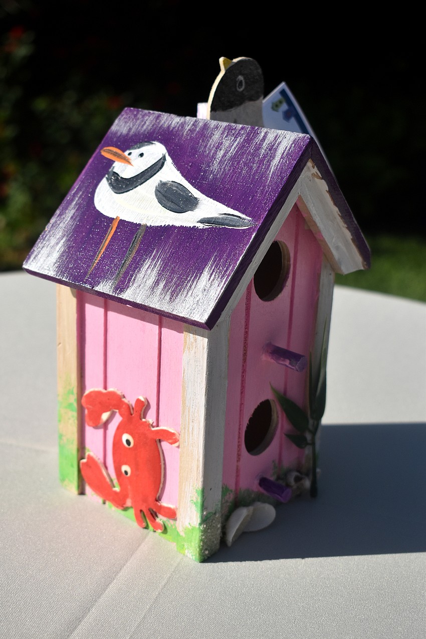 Easterseals Happiness House provided painted bird houses in support of the event.