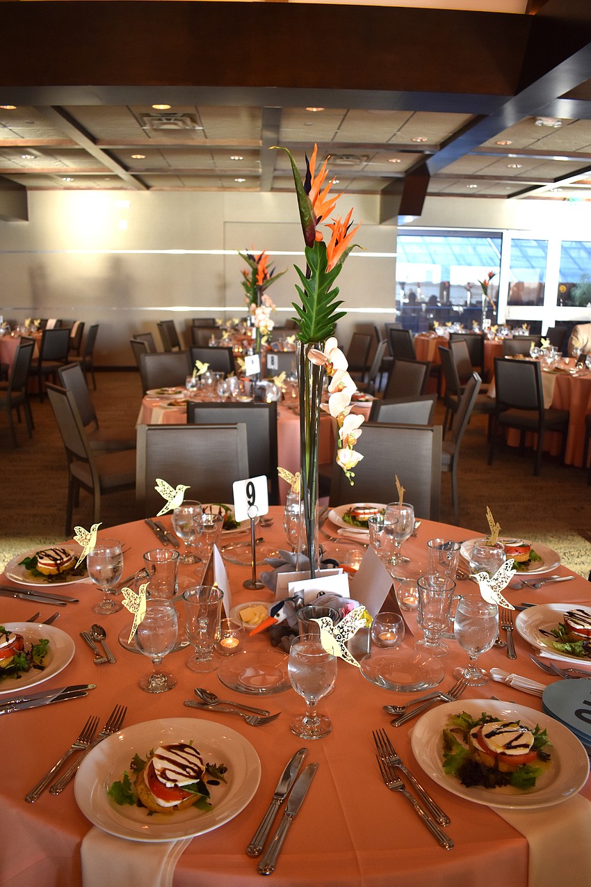 Each water glass was topped with a bird to go with the theme of the evening.