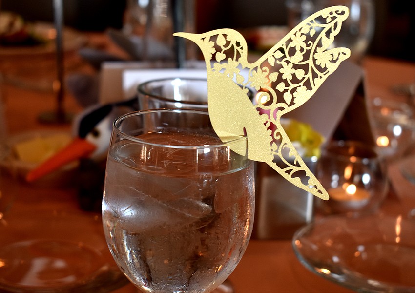Each water glass was topped with a bird to go with the theme of the evening.
