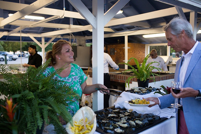 Stephanie Brown serves oysters from the Siesta Key Oyster Bar.
