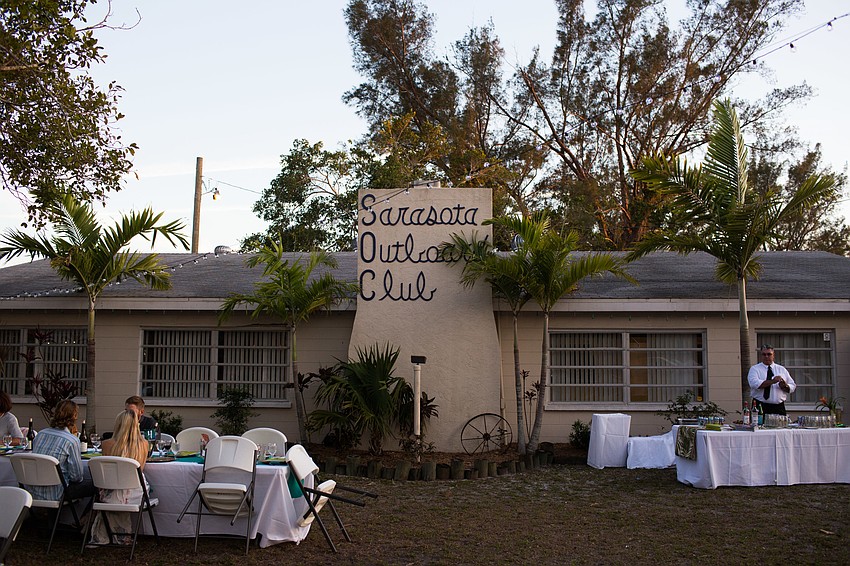 The dinner party was hosted at the Sarasota Outboard Club.