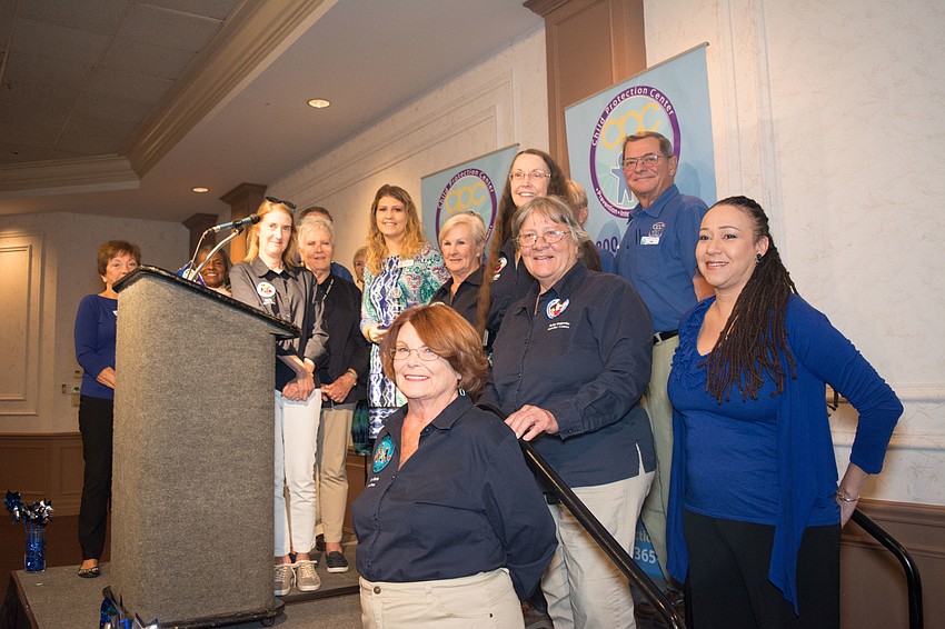 Child Protection Center volunteers receive recognition during the breakfast event.