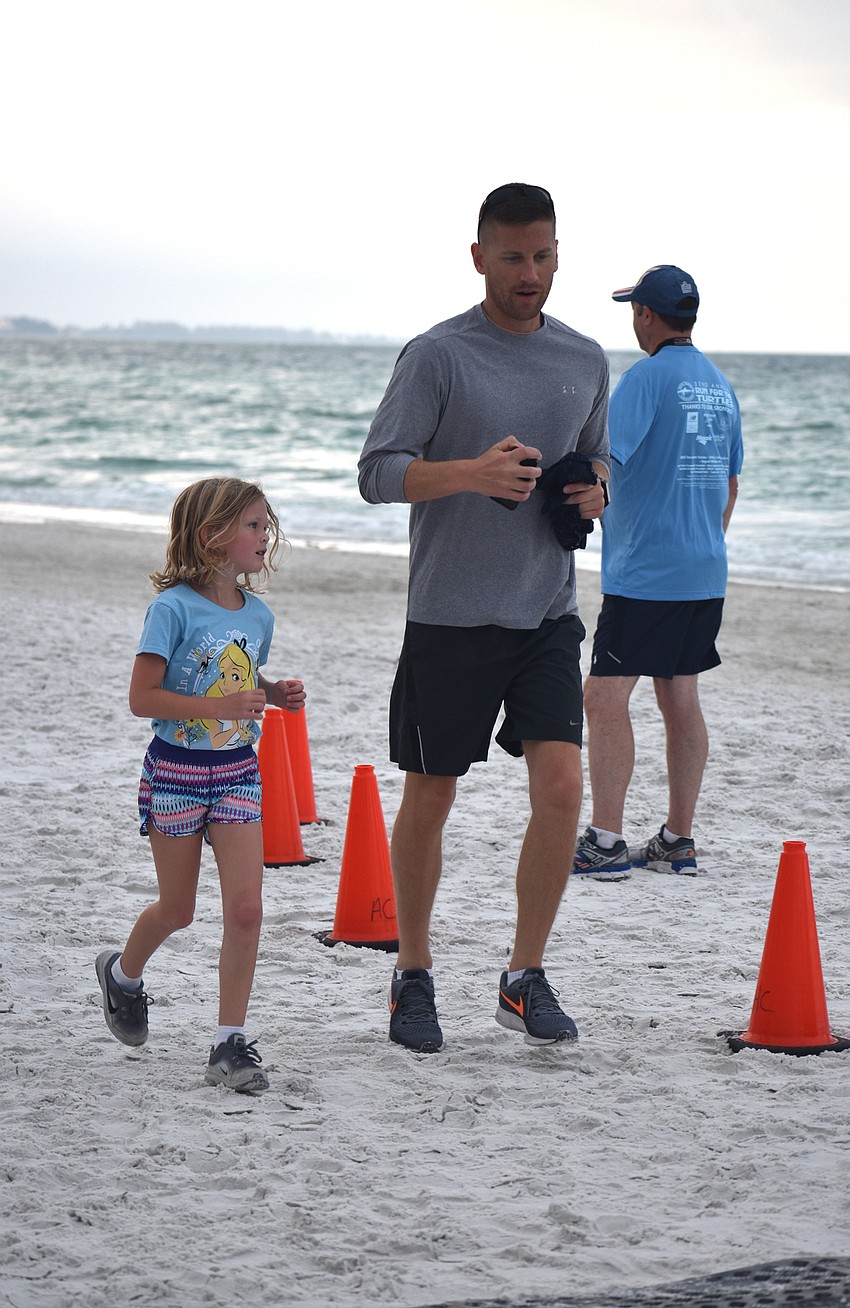 Anabel and Patrick O’Malley finishes the 1-mile fun-run/walk.