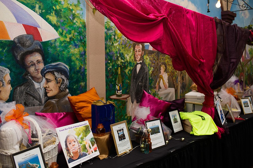 Silent auction items lined the back of the atrium.