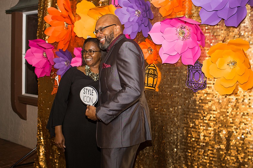Teresa and Trevor Harvey pose for a photo.