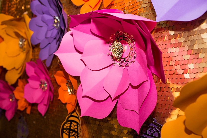 CC's Paper Artistry did the decor for the photo booth.