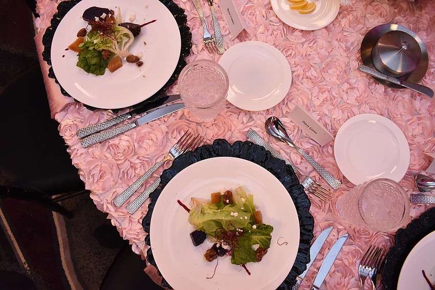 The tablecloths carried out the pink floral theme.