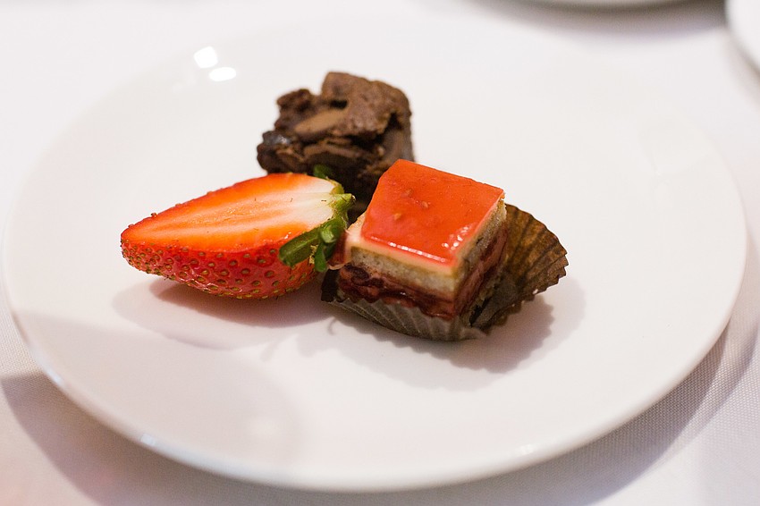 Each place was given a plate of desserts.