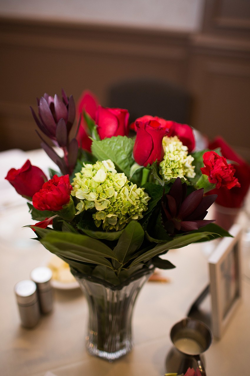A bouquet adorned the front table.