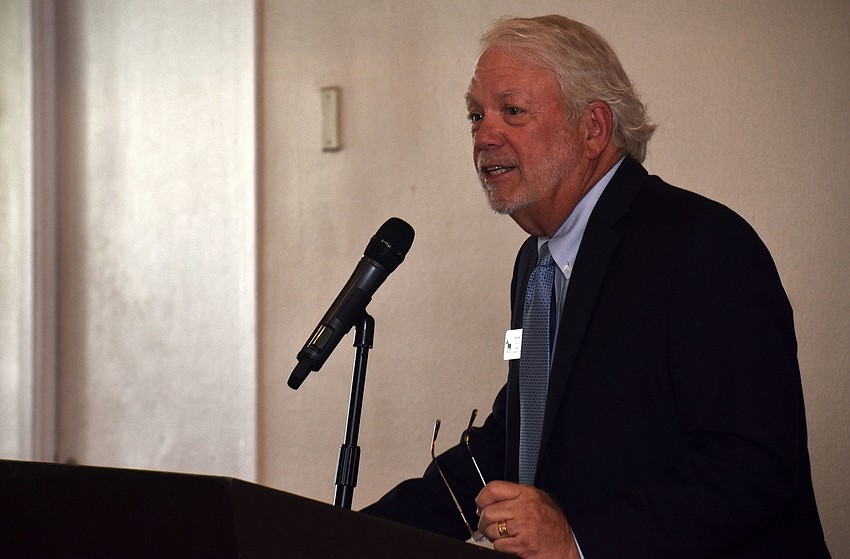 Longboat Key Democratic Club President Ken Marsh addresses the crowd.