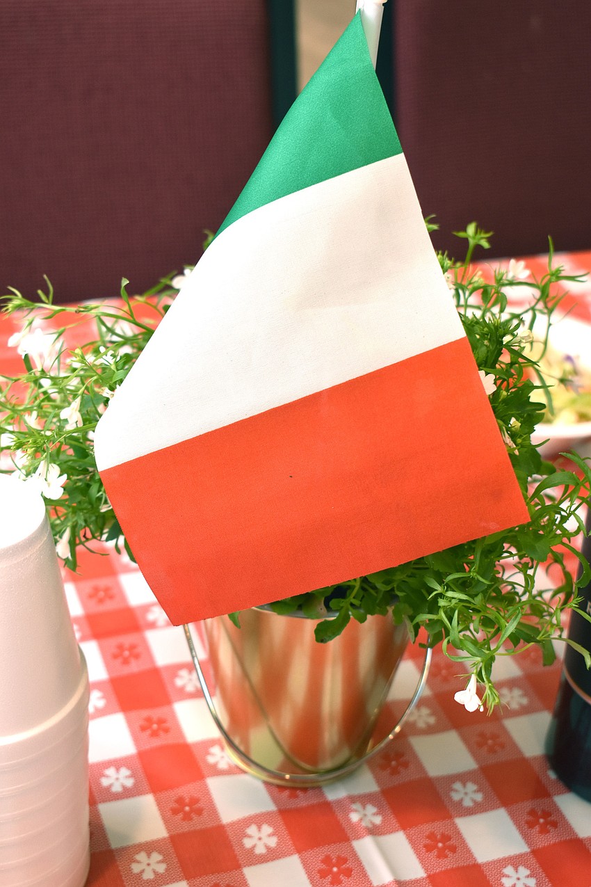 Italian flags decorated each table to match the theme.