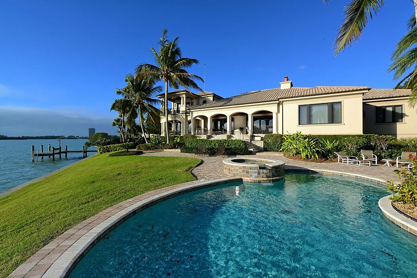 The home and lot, situated at 622 and 626 S. Owl Drive, offers 230 feet of water frontage and more than 54,000 square feet of property.