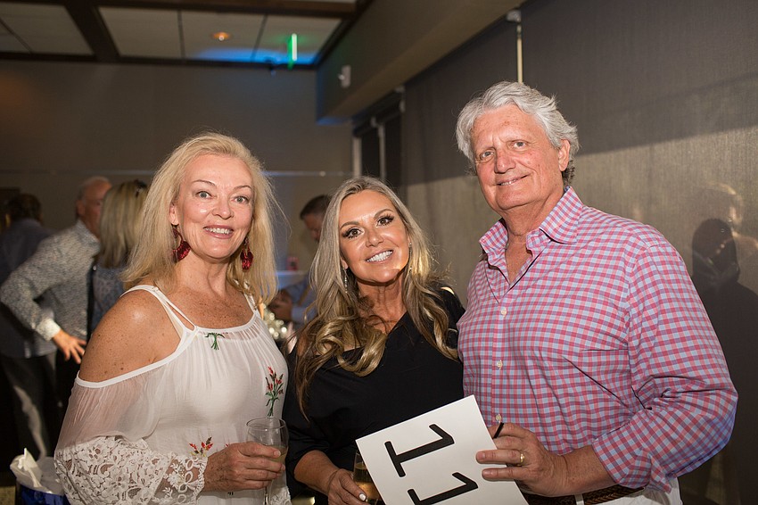 Patti Lee Curtis, Co-Chairwoman Barb Lancer and Wayne Curtis