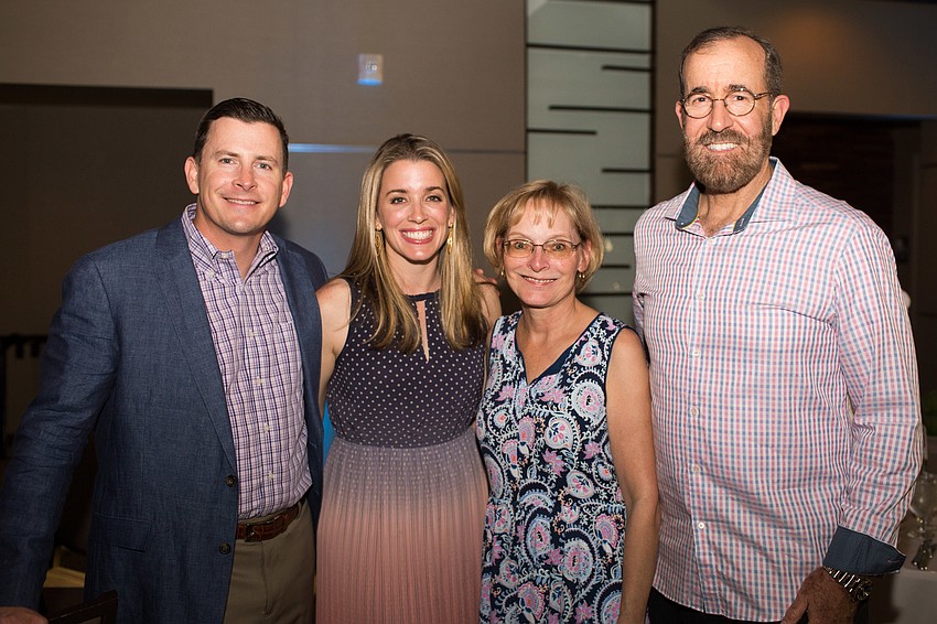 Todd and Elena Reuter with Linda and David Thompson