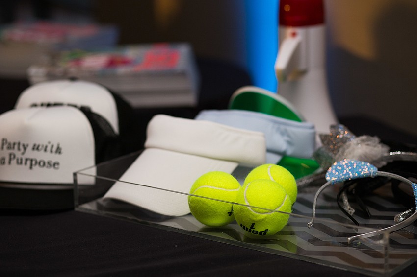 The photo booth featured tennis-themed props.