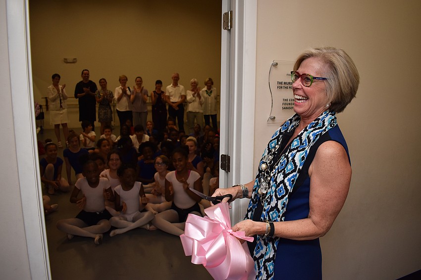 President and CEO of the Community Foundation of Sarasota County Roxie Jerde laughs as the students cheer.