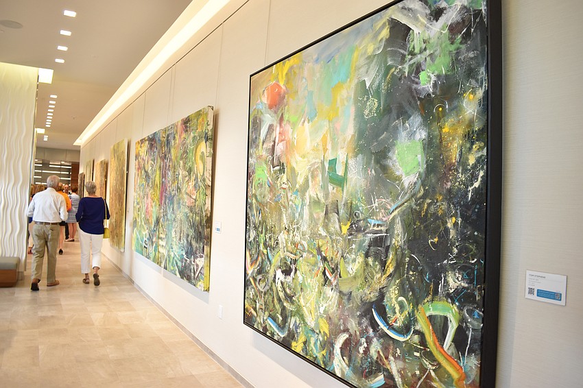 Several Tom Stephens paintings are on display in the lobby.