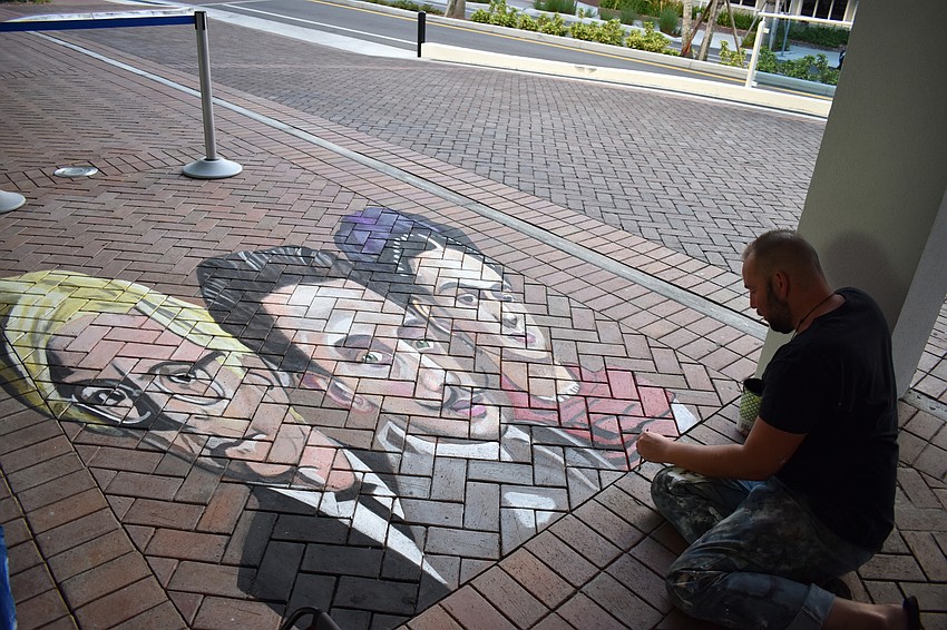 Truman Adams spent 17 hours on this street art piece, which is made of glue and chalk.