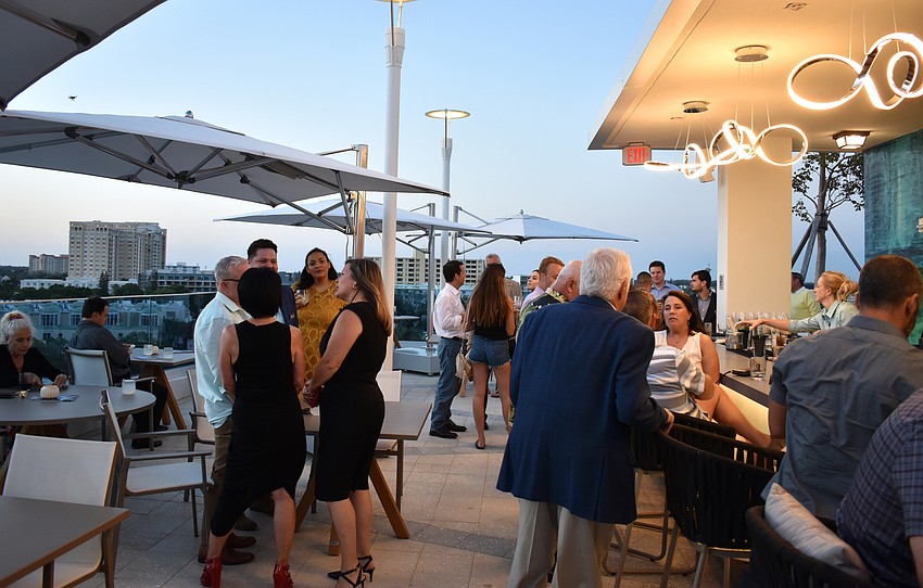 The rooftop bar overlooks Sarasota Bay and part of the downtown Sarasota skyline.