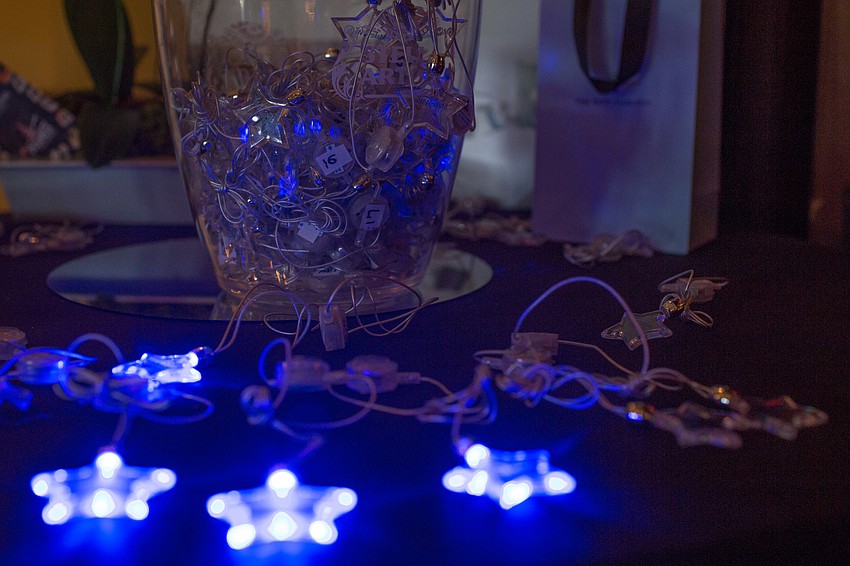 Raffle necklaces were being sold during cocktail hour for a night stay and breakfast at The Ritz-Carlton, Sarasota.