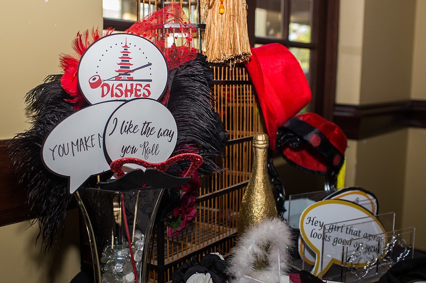 The photo booth props fit the event theme.