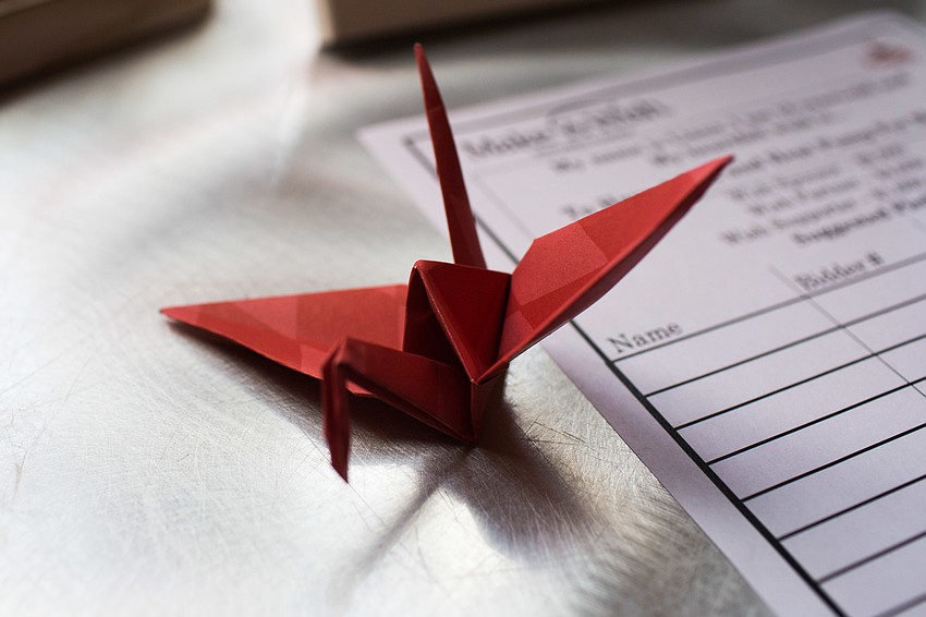 Paper origami decorated the tables.