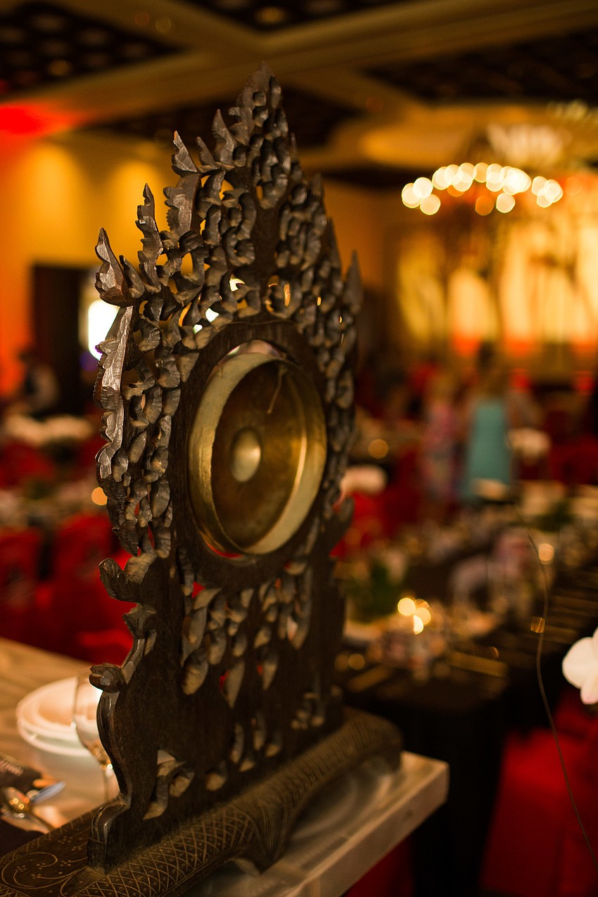 The gong was struck to signify it was time for dinner.