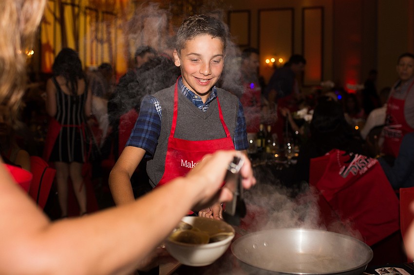 Matias Castro cooks the first course.