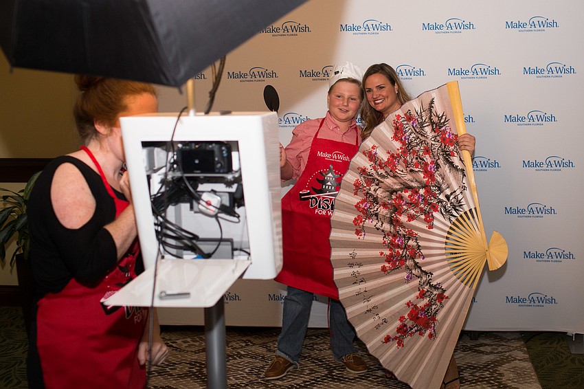 Ryan Blitz and Rebecca Blitz pose in the photo booth.
