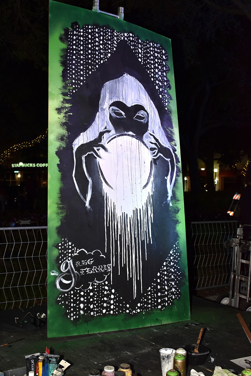 Visual artist Greg Ferris created this piece with spray paint and acrylic over a span of two hours during the event.