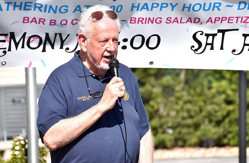 Mayor George Spoll speaks to the crowd.