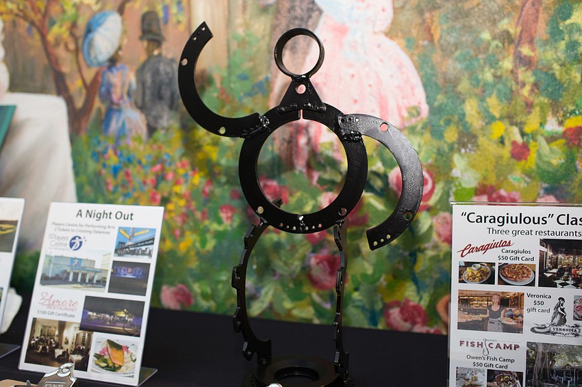 A silent auction table lined the back of the atrium.