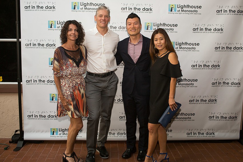 Ursula and Michael Camp with Scott and Gina Han