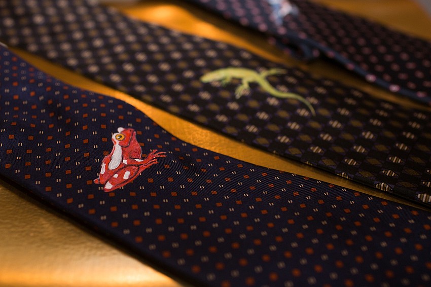 The ties were hand-painted by artist Kay Curtis.