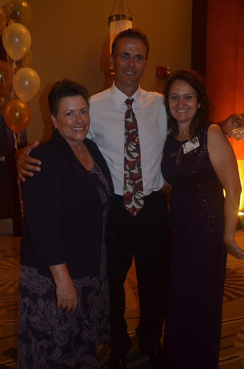 Lakewood Ranch High chaperones Jenny Galieno, Mark Napier and Rebekah Lester had as much fun as the students.