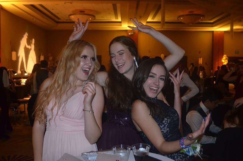 Juniors Jennifer Carter, Kamila Kemenyfy- Rojas and Ivy Garcia show off their dance moves.