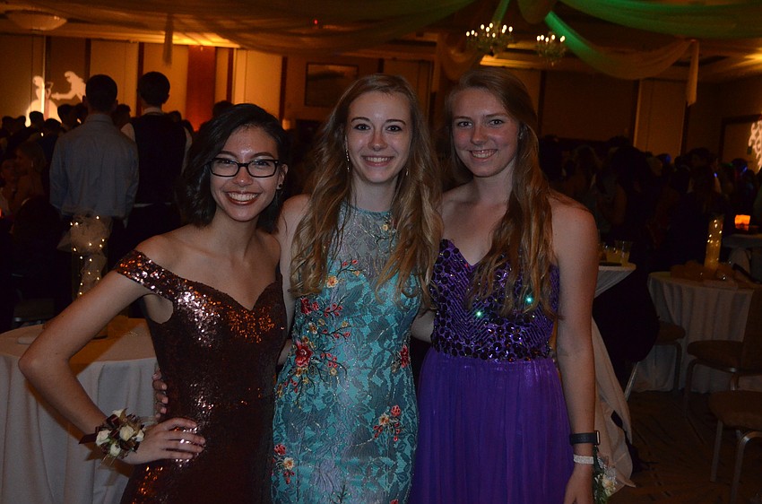 Seniors Denver Romano, Sydney Strimer and Haley Weltzien were dressed elegantly for the very special occasion.