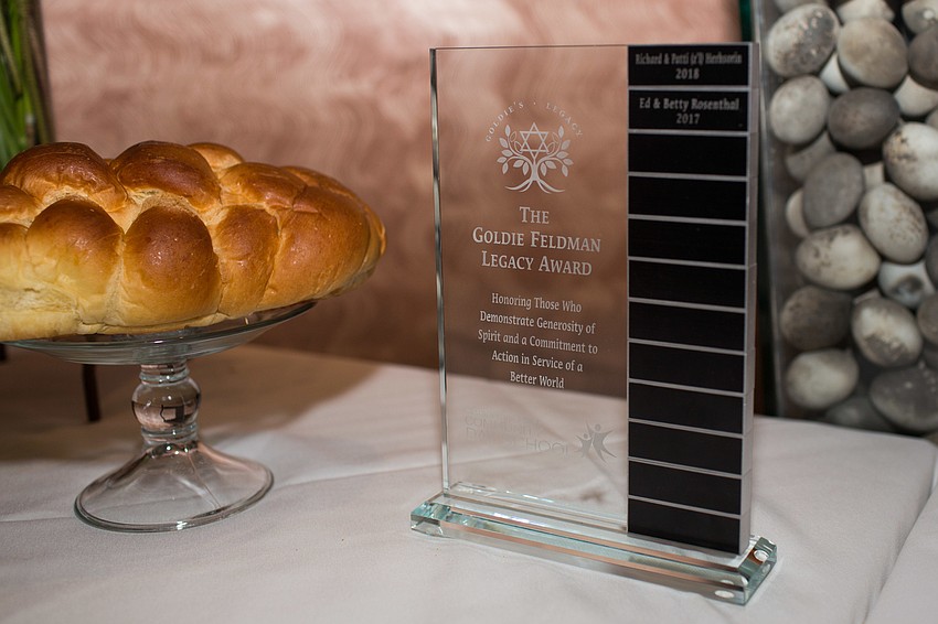 The plaque with the past award recipients was at the entrance to the restaurant.