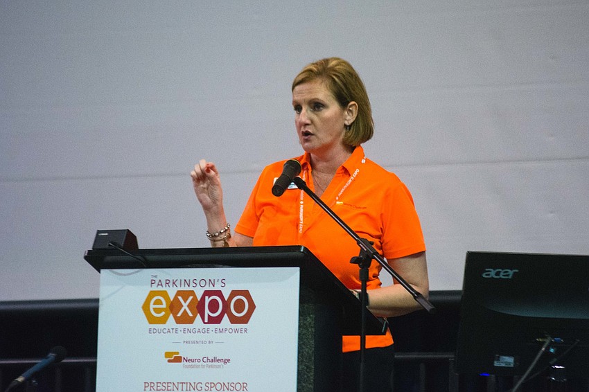 Neuro Challenge Foundation for Parkinson's Executive director Robyn Faucy introduces the keynote speaker.