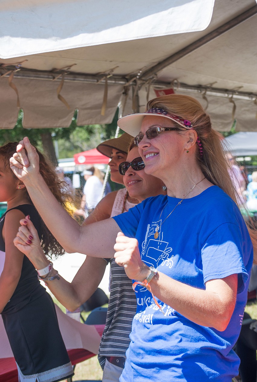 Mary Kavanshanski and Chris Koch dance to the Crawfish Crew.