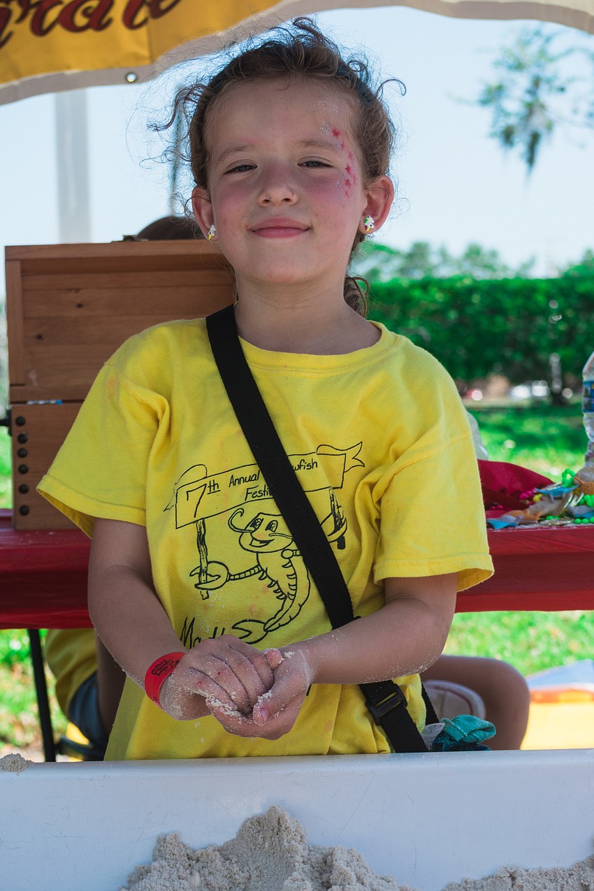Sue Briceno digs up some worms.