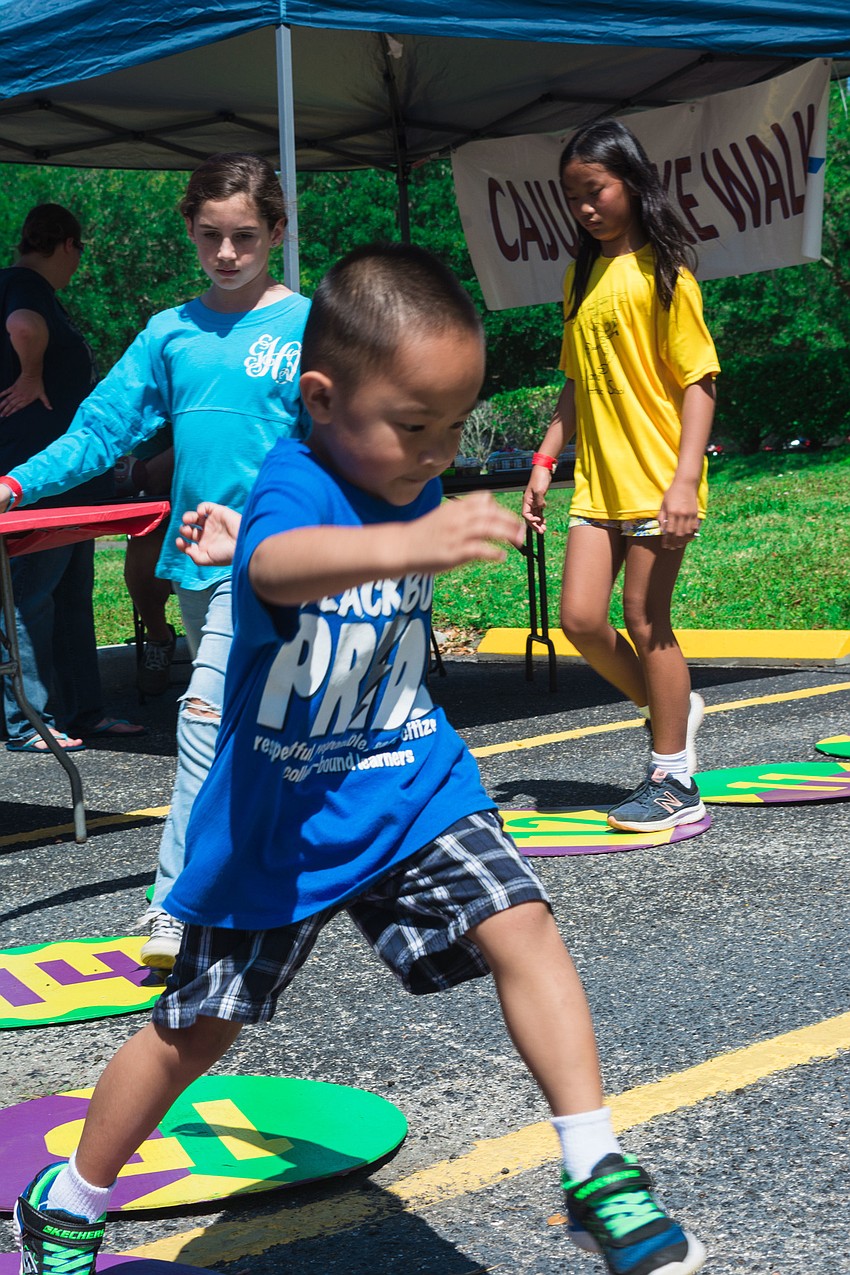 Rydan Mai hops around the cake walk.