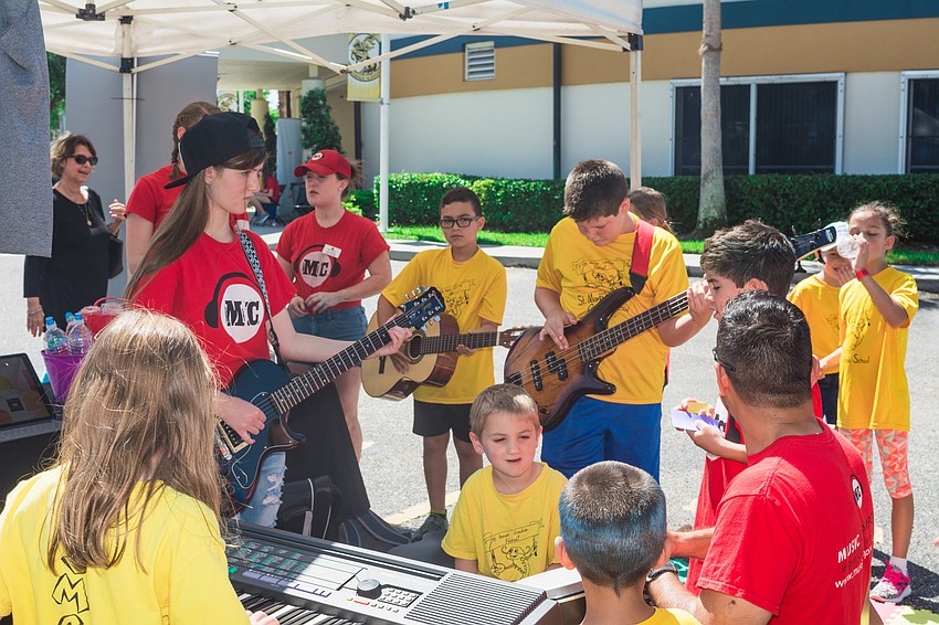 The Crawfish Crew practice before their performance.